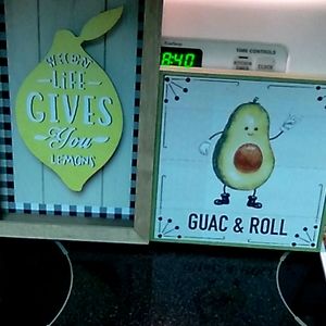 Two kitchen walls hanging